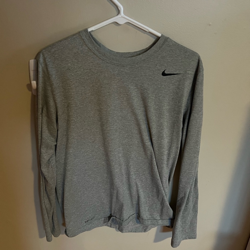 Nike Grey Long sleeve size M. Worn once. Perfect condition.